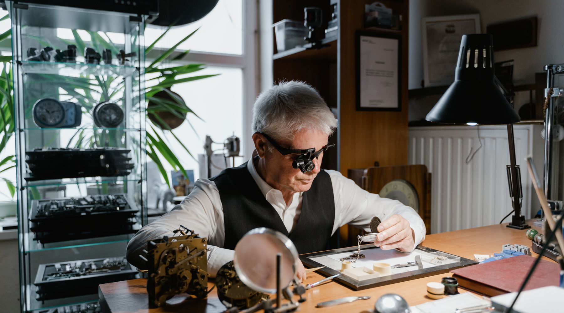 Watchmaker at a bench